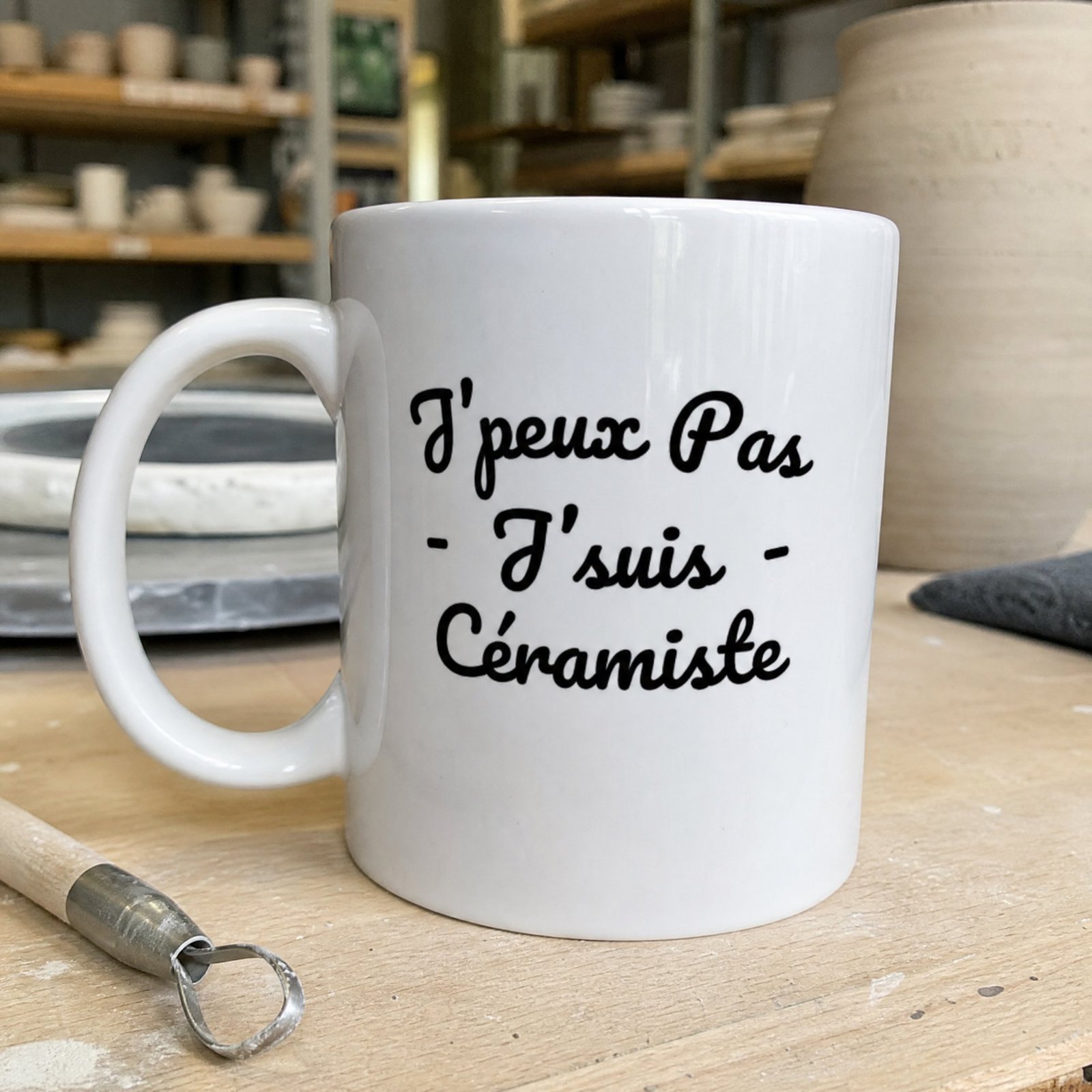 Mug J’peux pas j’suis céramiste – écriture cursive noire